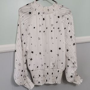 Glam white blouse with black stars